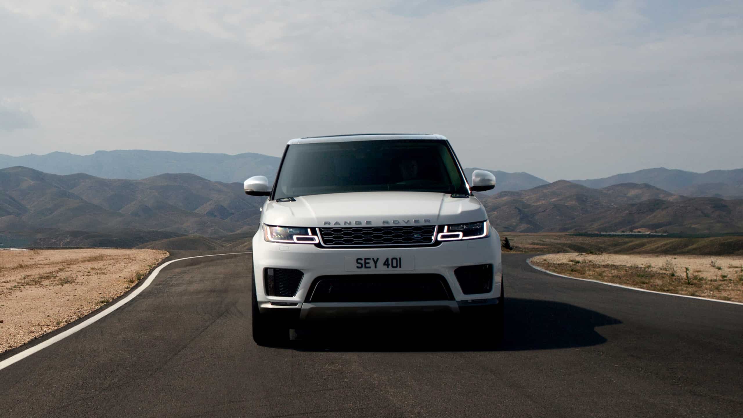 Range Rover Sport Driving On Mountain Runway Road