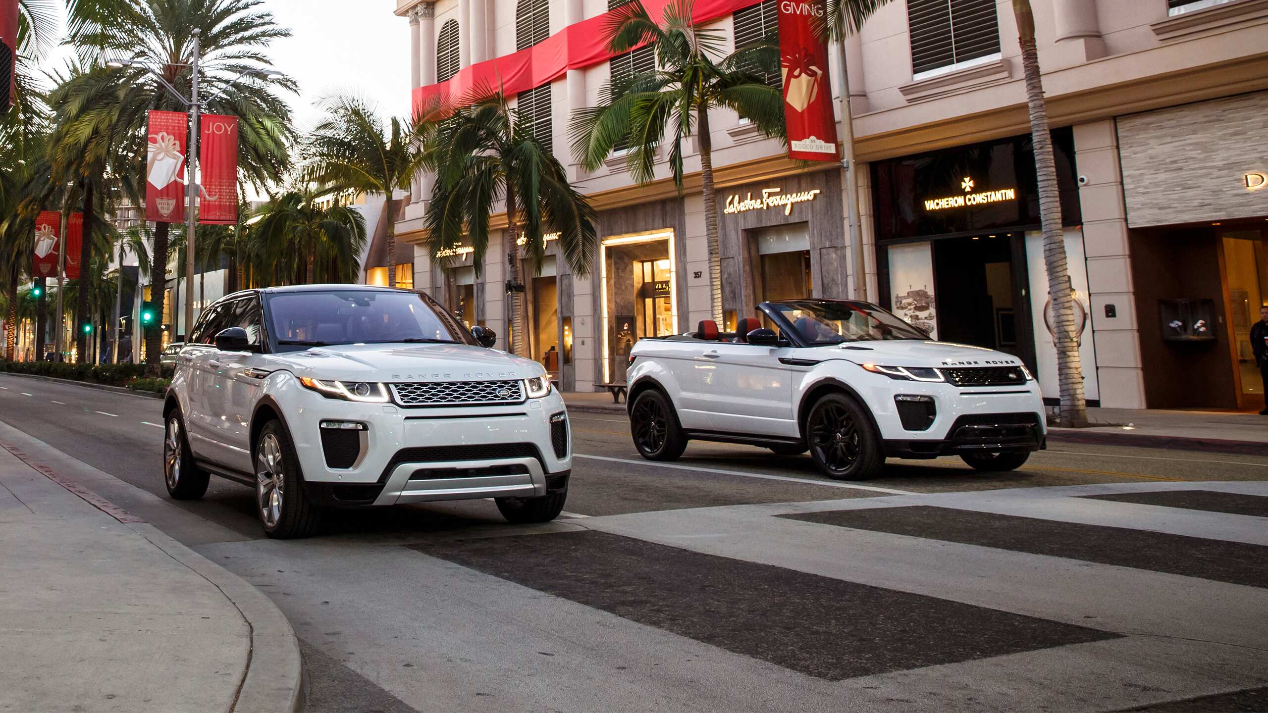 Range Rover 2 Models Moving on this Street Road