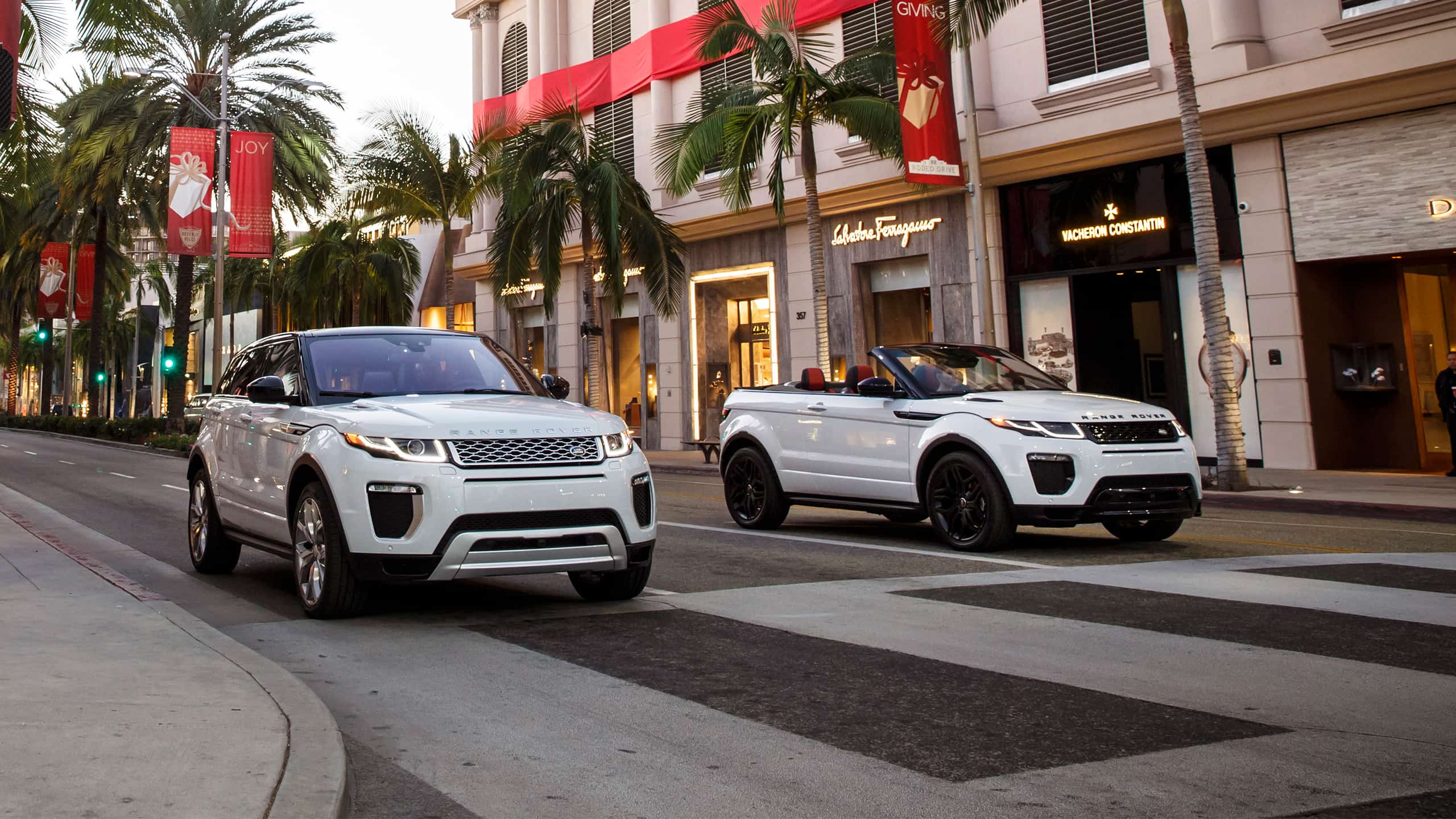 Range Rover 2 Models Moving on this Street Road