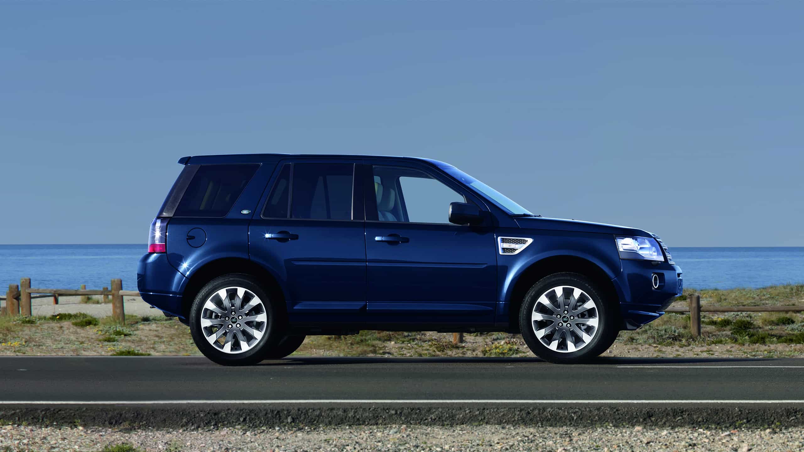 NEW LAND ROVER FREELANDER ON BEACH SIDE
