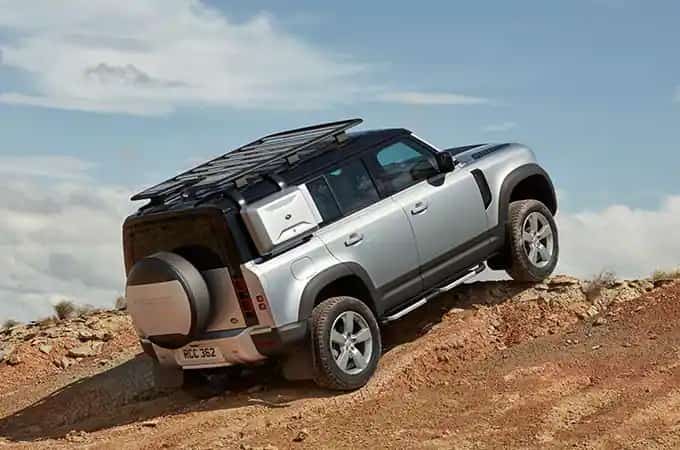 Range Rover driving uphill